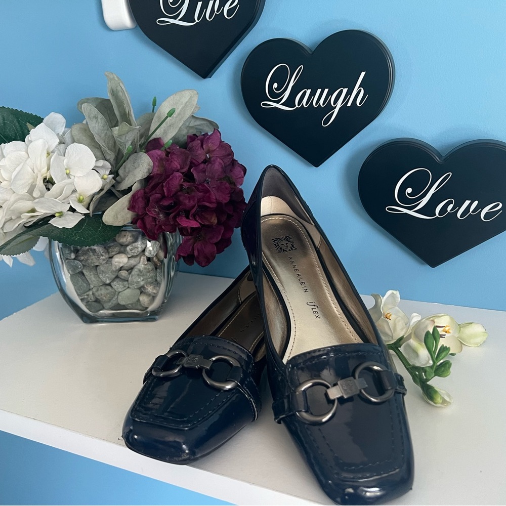 Anne Klein blue patent fold leather flat with toggle type accents size 8.